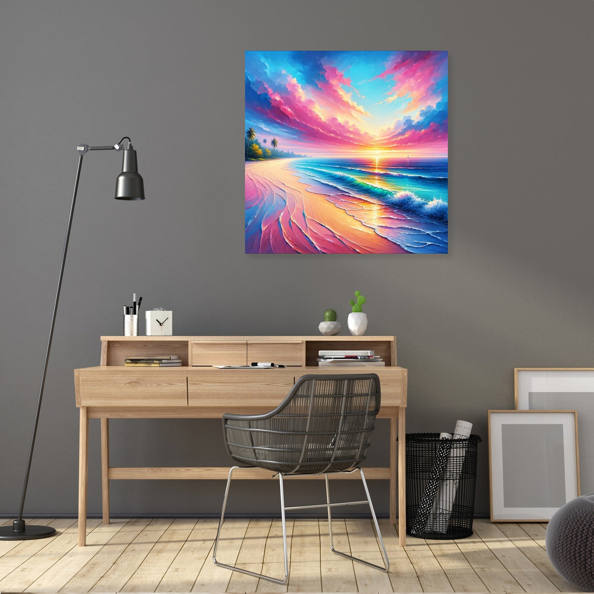 Tropical beach, palm trees, small waves, bright sun and large pink clouds in early morning scene. Printed on canvas with wood frame. Hanging on wall above a wooden desk. Plus tall lamp and mesh office chair.
