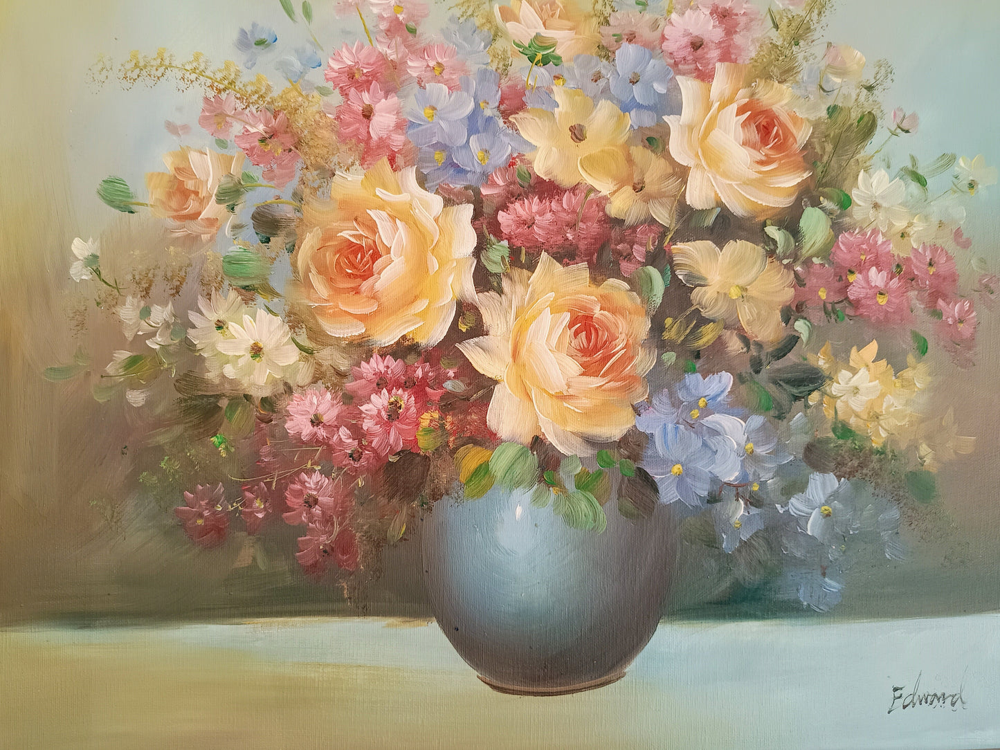 Original oil painting on canvas. Vibrant summer flowers, including yellow roses, in a blue pot.