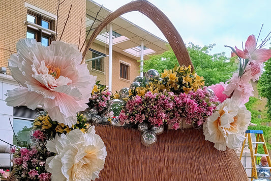 What a big and stunning handbag ! Workers are finishing the handbag display before the start of the Chelsea In Bloom flower show. From 19th May to 25th May. The annual event takes place around Sloane Square and King's Road in London, UK.