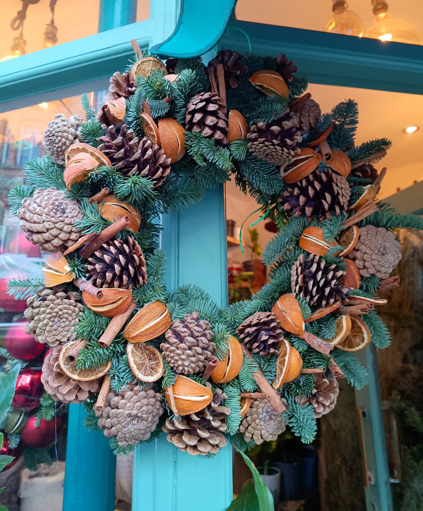 Exclusive, limited edition Christmas wreath with cinnamon, oranges and pine cones