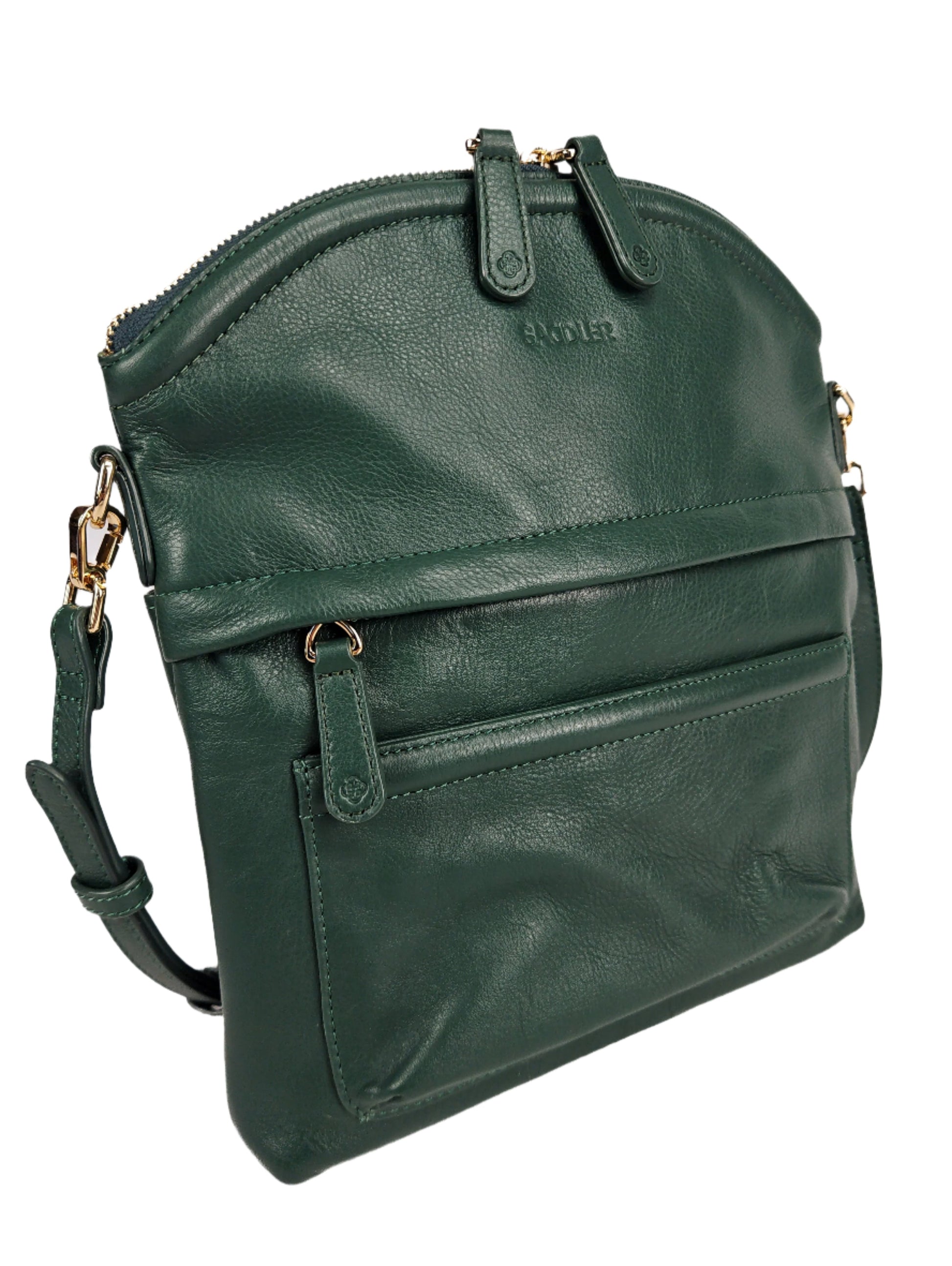 Cose up view Kimberley handcrafted leather crossbody bag in green. Leather strap.