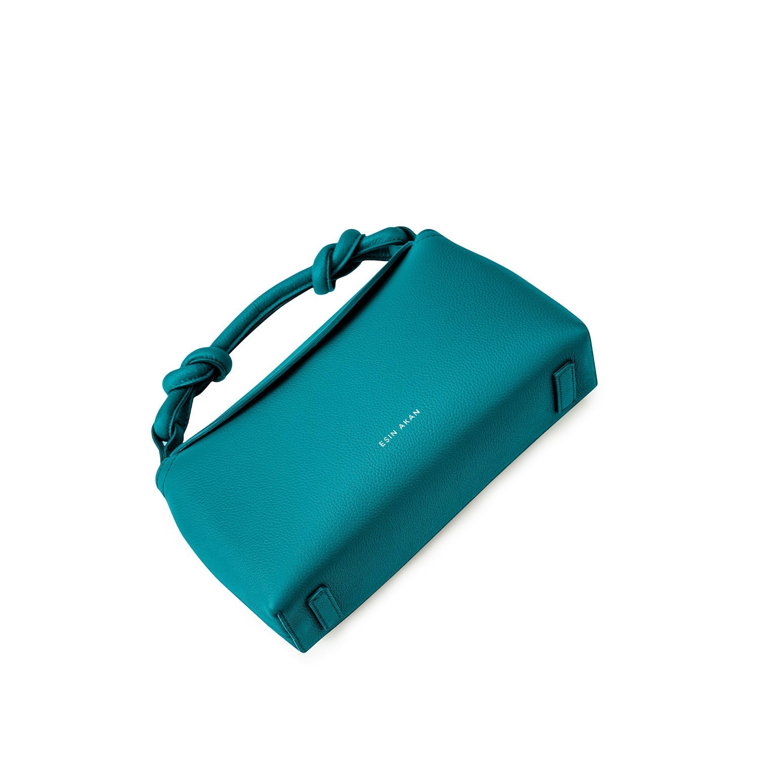 Midi Sloane teal leather bag tilted to show reinforced flat base and protective leather strips.