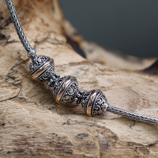 A handmade Sterling silver and 18K gold necklace for women. Handmade by Oriental artisans. Length is 44.5cm.