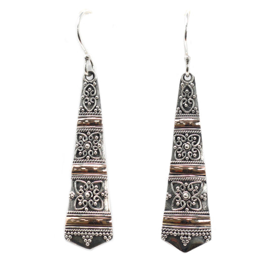 A pair of pretty drop earrings for women. Handmade in Sterling silver and 18K gold.