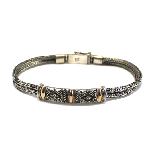Unisex jewellery. An handmade bracelet. One chain. Sterling silver and 18K gold.