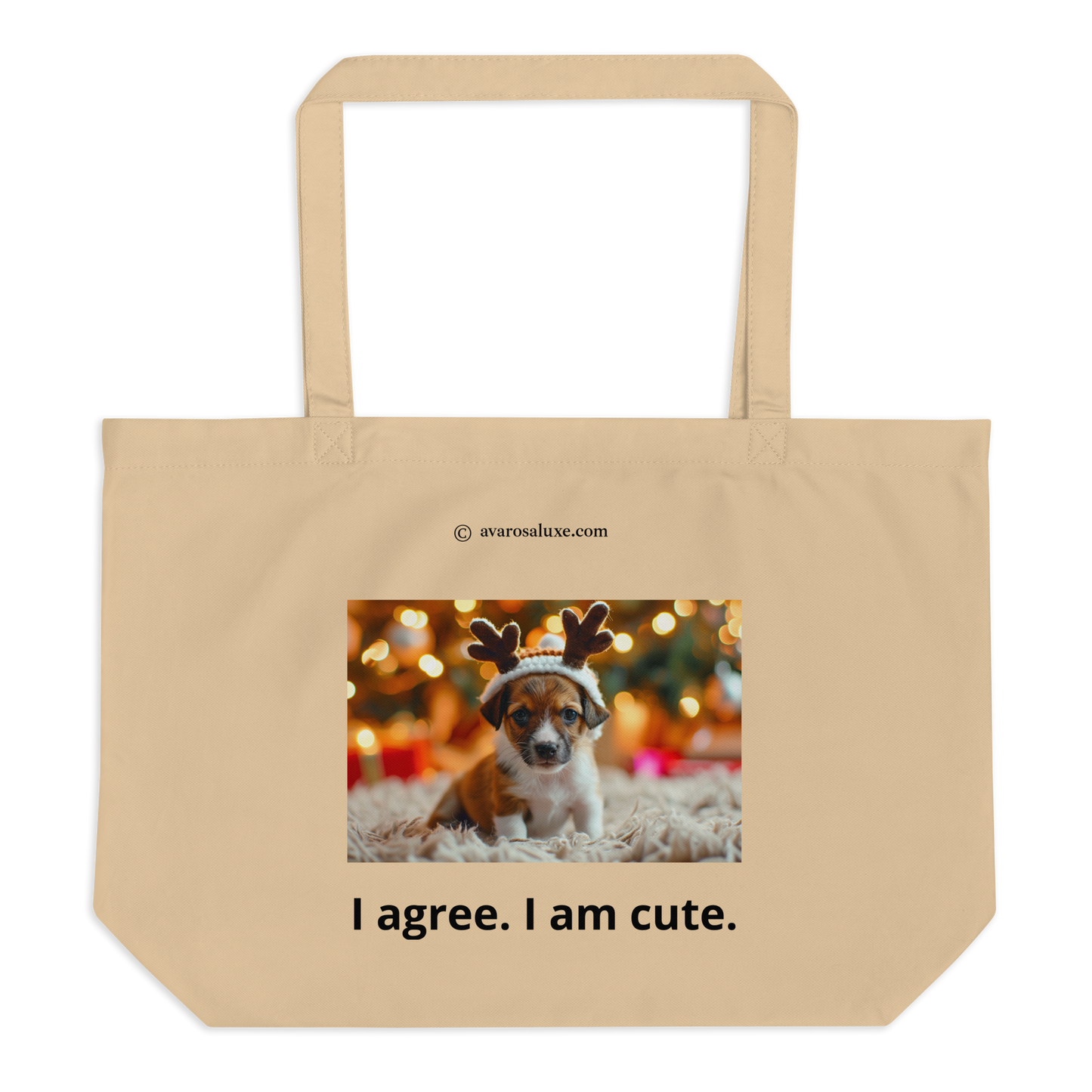 Large beige cotton tote bag. Printed with a dog wearing a hat with reindeer antlers and text 'I agree. I am cute.' on a blurred Christmas lights background.