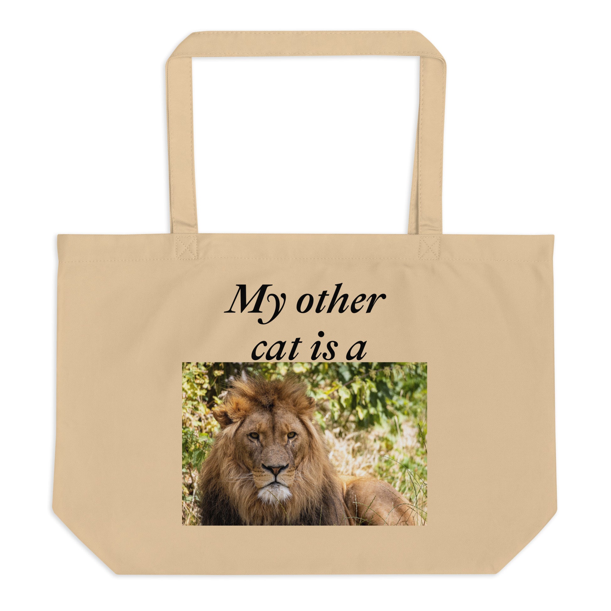 Large beige organic cotton tote bag. Custom printed. Big lion image below words: My other cat is a 