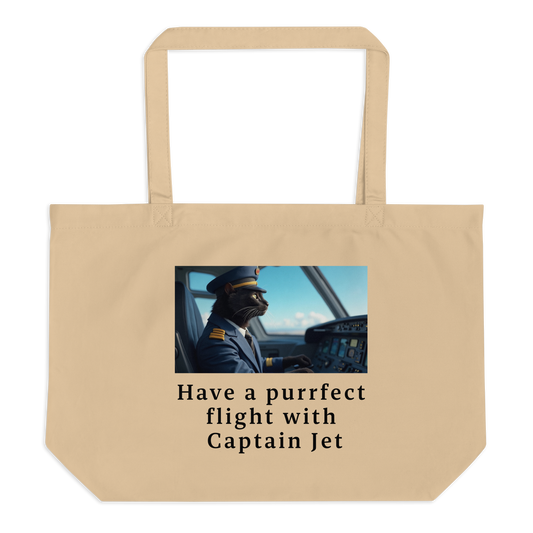 New and exclusive beige organic cotton tote bag. Has a printed picture of a black cat in a pilot's uniform and text on a white background.