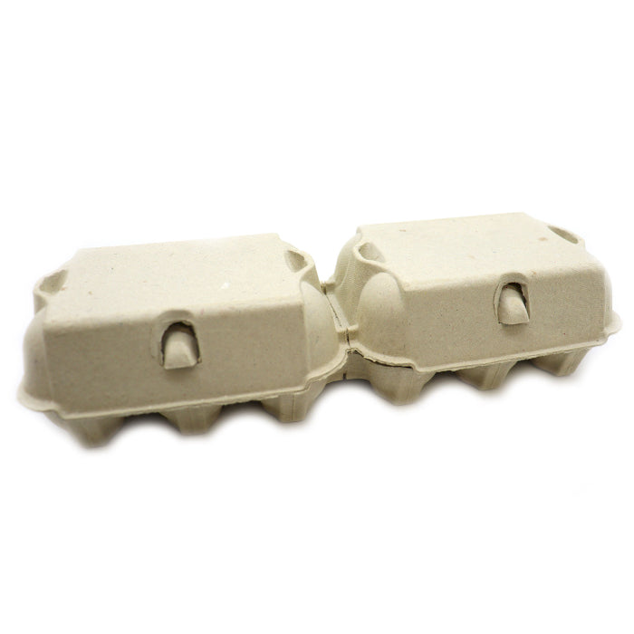 Two cardboard cartons. Packaging for egg shaped bath bombs.
